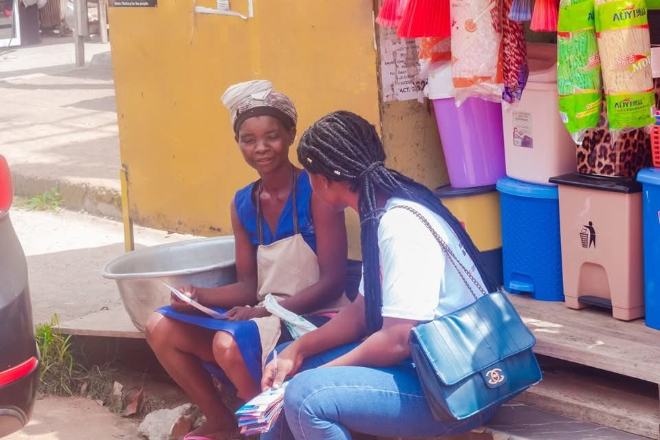Reaching a market woman with screening information