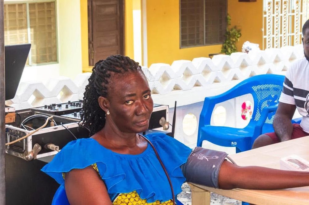 A woman receiving a health screening
