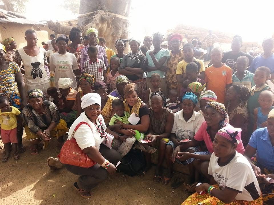 Jana Foundation team with community members in the field