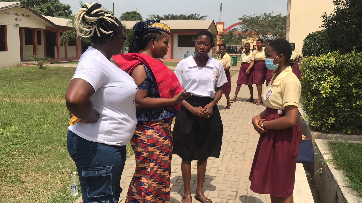 Jana Foundation staff engaging with a student